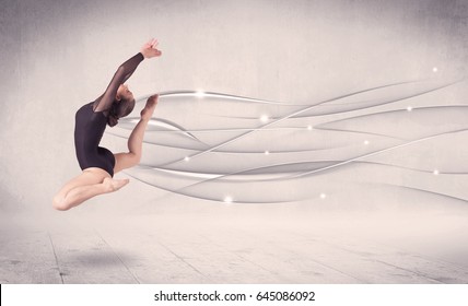 Ballet dancer performing modern dance with abstract lines concept on background Foto Stock