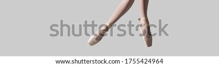 Ballet dancer in pointe shoes, close up