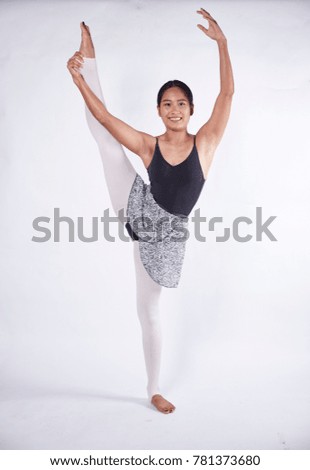 Ballet dancer pose the performance on white background