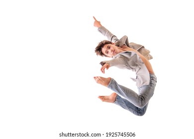 Ballet dancer teenage boy jumping barefoot, isolate on a white background.