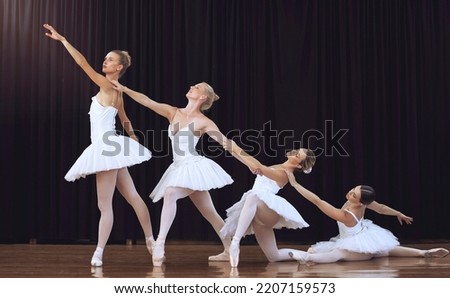 Ballet, dancing and group stage performance at an art theatre with creative movement. Dancers, flexible and young women ballerinas dance elegantly together performing swan lake play in costumes