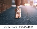 Ballet, shoes and street with dancer outdoor for theater performance, recital or rehearsal closeup. Asphalt, balance and dance with ballerina person on road or sidewalk in alley for art and talent