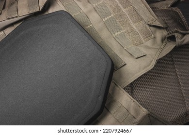 Ballistic insert for body armor. Armored insert for a bulletproof vest. Body armor close-up.