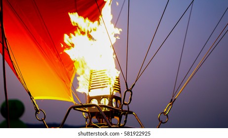 A balloon burner in operation with its hot flame