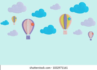 Balloon And Cloud Patches On Blue Paper Textured Background. Flat Lay.