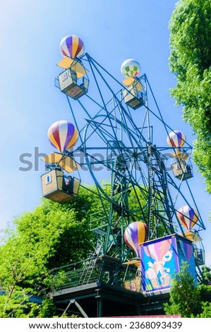 Balloon ferris wheel ride at the Tivoli Garden amusement park and pleasure garden in Copenhagen, Denmark.