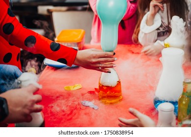 The Balloon Is Inflated With Steam Using Dry Ice . Close Up .