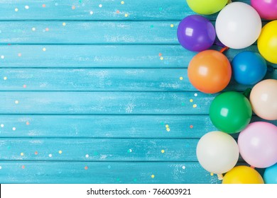 Balloons and confetti border. Birthday or party background. Festive greeting card.