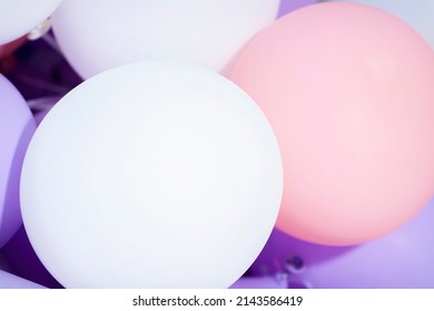 Balloons of pastel fashion colors. Creative background for your text. Selective focus