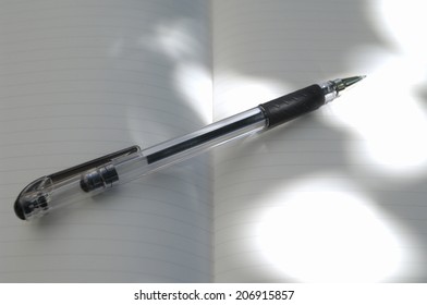 Ballpoint Pen And Notebook