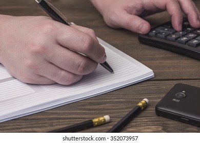 ball-point pen to write in the notebook