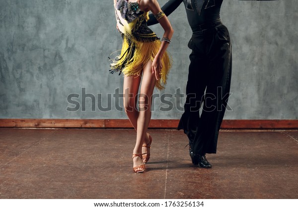 Ballroom dancing. Young couple ballroom dancers.\
Samba dance