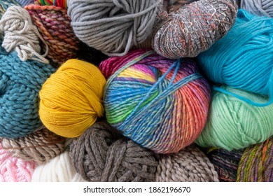 Balls of wool and yarn knitting backdrop