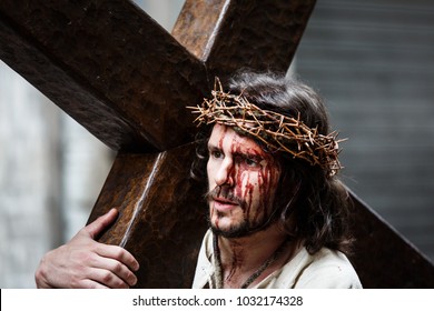 BALMASEDA, SPAIN - APRIL 14, 2017: Unidentified actor, Jesus with the cross, in the representation of the living passion