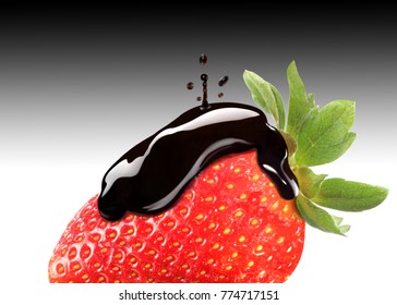 Balsamic Vinegar Dripping On A Ripe Strawberry