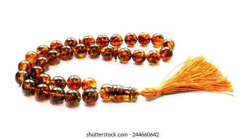 Baltic Amber Islamic Rosary Isolated On White 