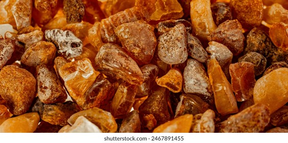 Baltic amber with visible details. background or textura
