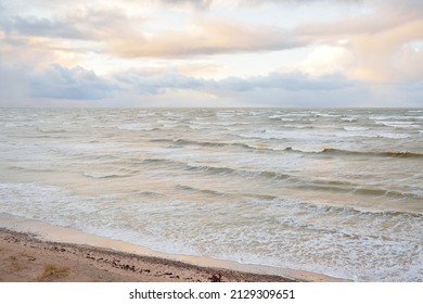 Baltic Sea After The Storm. Dramatic Sky, Glowing Clouds, Soft Sunlight. Waves, Splashing Water. Picturesque Scenery, Seascape, Nature. Panoramic View