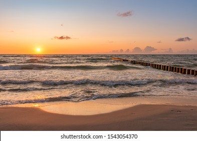 Baltic sea coast at colorful summer sunset
