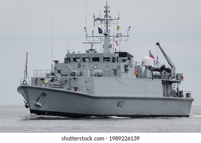 BALTIC SEA, POLAND - 2021: Royal Navy Minehunter Sails On The Sea 
