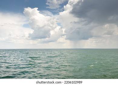 Baltic Sea Under Dramatic Clouds After Thunderstorm. Blue Sky. Panoramic Aerial View From The Coast. Seascape. Cyclone, Gale, Storm, Rough Weather, Meteorology, Climate Change, Natural Phenomenon