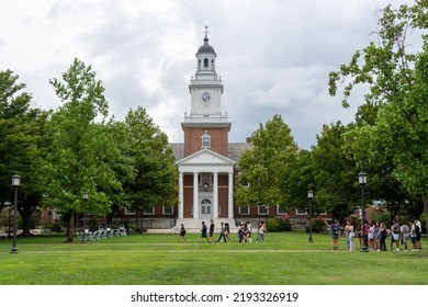 BALTIMORE, MARYLAND, AUGUST 21, 2022 - New Students Walk Past Gilman Hall On The Johns Hopkins University Campus During First Year Orientation.