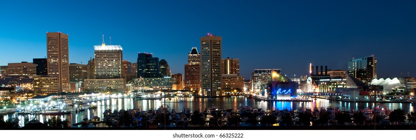 Baltimore Maryland Cityscape at Night:  A view of Baltimore, MarylandÃ¢Â?Â?s cityscape overlooking the Inner Harbor and Patapsco River at night.