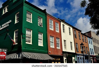 Baltimore, Maryland - July 22, 2013:  A mix of 18th and 19th century buildings now house shops, pubs, and restaurants at historic Fells Point