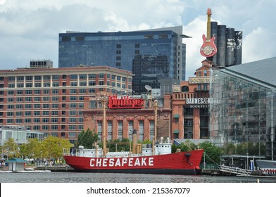 BALTIMORE, MARYLAND - SEP 1: The National Aquarium and the Lightship Chesapeake at the Inner Harbor in Baltimore, Maryland, as seen on Sep 1, 2014. 