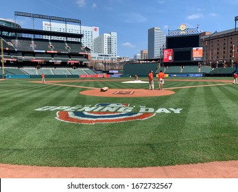 Baltimore, Maryland / United States, April 6, 2019 -  View Behind Home Plate of Opening Day Field Paint at Orioles Park at Camden Yards Home of the Baltimore Orioles 