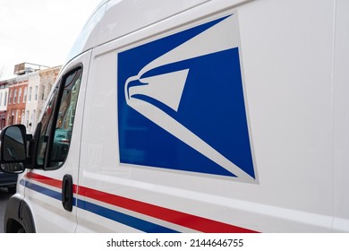 Baltimore, Maryland US - April 9, 2022: Driver Side Of Sprinter Van Mail And Package Delivery Vehicle Belonging To United State Postal Service Worker On Their Downtown Urban Neighborhood Route