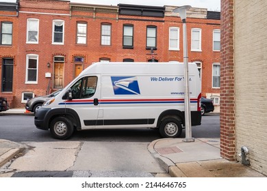 Baltimore, Maryland US - April 9, 2022: US Postal Service Vehicle On Downtown Daytime Route Illegally Parked, Blocking Traffic On Narrow Urban Roadway Street With Sprinter Van Gas Delivery Vehicle