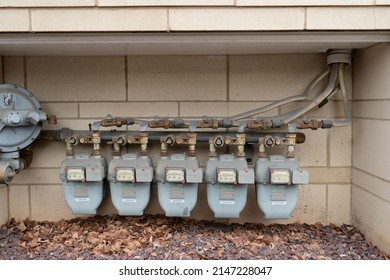 Baltimore, Maryland US - April 9, 2022:  Row of natural gas line meters for individual units of residential building along Caroline street on border of Harbor East and Fells Point neighborhoods