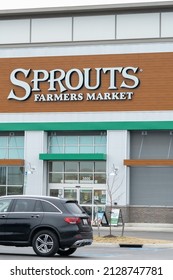 Baltimore, Maryland, US - February 24, 2022: Sprouts Farmers Market downtown Canton waterfront location, urban supermarket among new retail and residential construction at end of Boston st