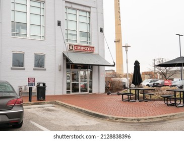 Baltimore, Maryland, US - February 24, 2022: Exterior Of Chipotle Fast Casual Burrito Shop At The Can Company Shopping Center On Boston Street, Open Parking Spot And Outdoor Tables