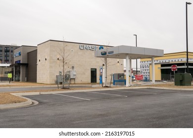 Baltimore, Maryland, US - February 24, 2022: Side View Of Chase Financial Services Building With Drive Through And Large Open Parking Lot Design In Urban Shopping Center