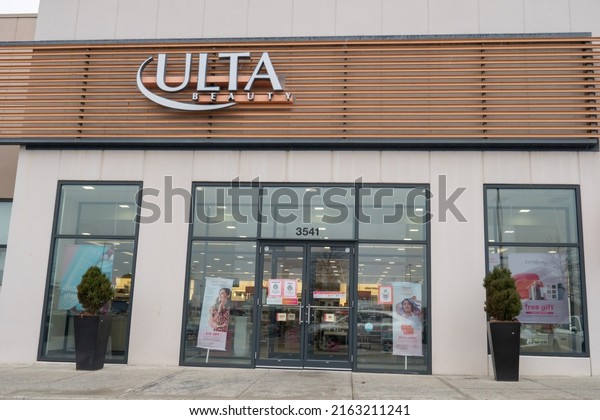 Baltimore, Maryland, US - February 24, 2022:\
exterior facade of Ulta Beauty retail makeup store location seen\
from parking lot at Canton Crossing shopping center in downtown\
along boston street