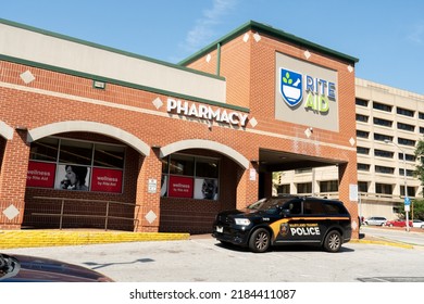 Baltimore, Maryland US - June 25, 2022: Transit Police In Front Of Rite Aid Pharmacy 