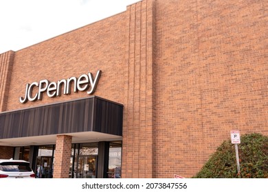 Baltimore, Maryland US - November 12, 2021: Brick And Mortar Exterior Of Retail Merchant JC Penny Store Location With Awning Above Street Level Customer Entrance Attached To Shopping Mall