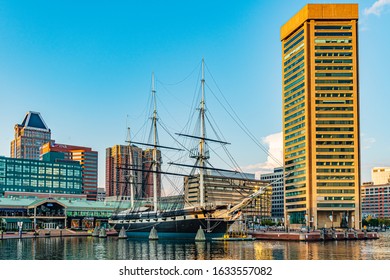 Baltimore, Maryland, US - September 4, 2019 View of Baltimore Harbor with USS Constellation Ship and office buildings
