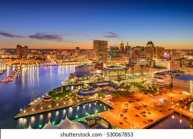 Baltimore, Maryland, USA inner harbor and downtown skyline at twilight.