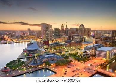 Baltimore, Maryland, USA inner harbor and downtown skyline at dusk.
