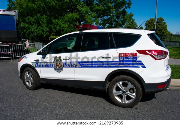 Baltimore, Maryland, USA - June 18 2022: A\
Baltimore City Police Vehicle parked near the AFRAM Festival in\
Druid Hill Park.