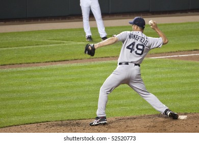 BALTIMORE - MAY 1: Tim Wakefield Of The Boston Red Sox Throws His First Pitch As A Reliever In 2010 During A Game At Camden Yards On May 1, 2010 In Baltimore, Maryland