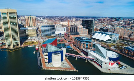 Baltimore, MD - January 27, 2018: An Aerial View Of The Baltimore City Skyline And The Inner Harbor On A Sunny Afternoon.