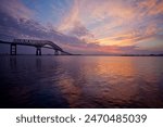 BALTIMORE, MD - JUNE 6, 2010 : Archive photo of the Francis Scott Key Bridge spanning the Baltimore Inner Harbor of the Chesapeake Bay as viewed from Fleming Park (Photo by Citizen Kepler)