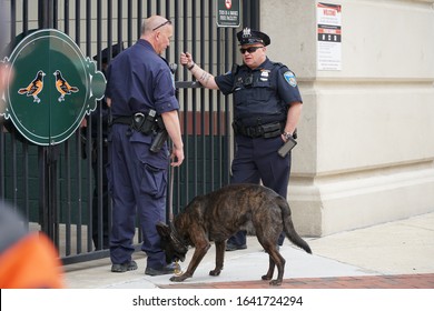 Baltimore, MD, USA - April 4 2019: A Police Officers Attends At The Downtown During Orioles Baseball Game At Oriole Park, Camden Yards.