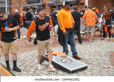 Baltimore, MD, USA - April 4 2019: People Palys Corn Hole During Orioles Baseball Game At Oriole Park, Camden Yards.