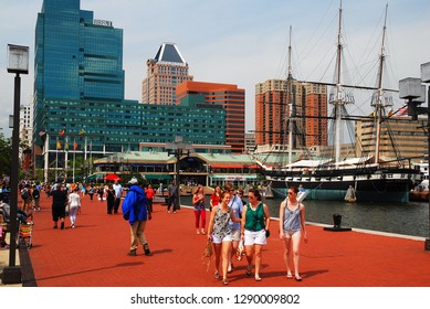 Baltimore, MD, USA May 10 People Enjoy A Warm Spring Day Walking On The Waterfront At Inner Harbor, In Baltimore, Maryland