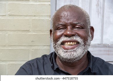 BALTIMORE, USA - JUNE 21 2016 - A Black Old Homeless Man In Baltimore Smiling For The Camera 